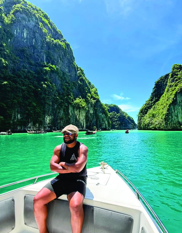 WakaWaka Doctor on a boat among limestone cliffs