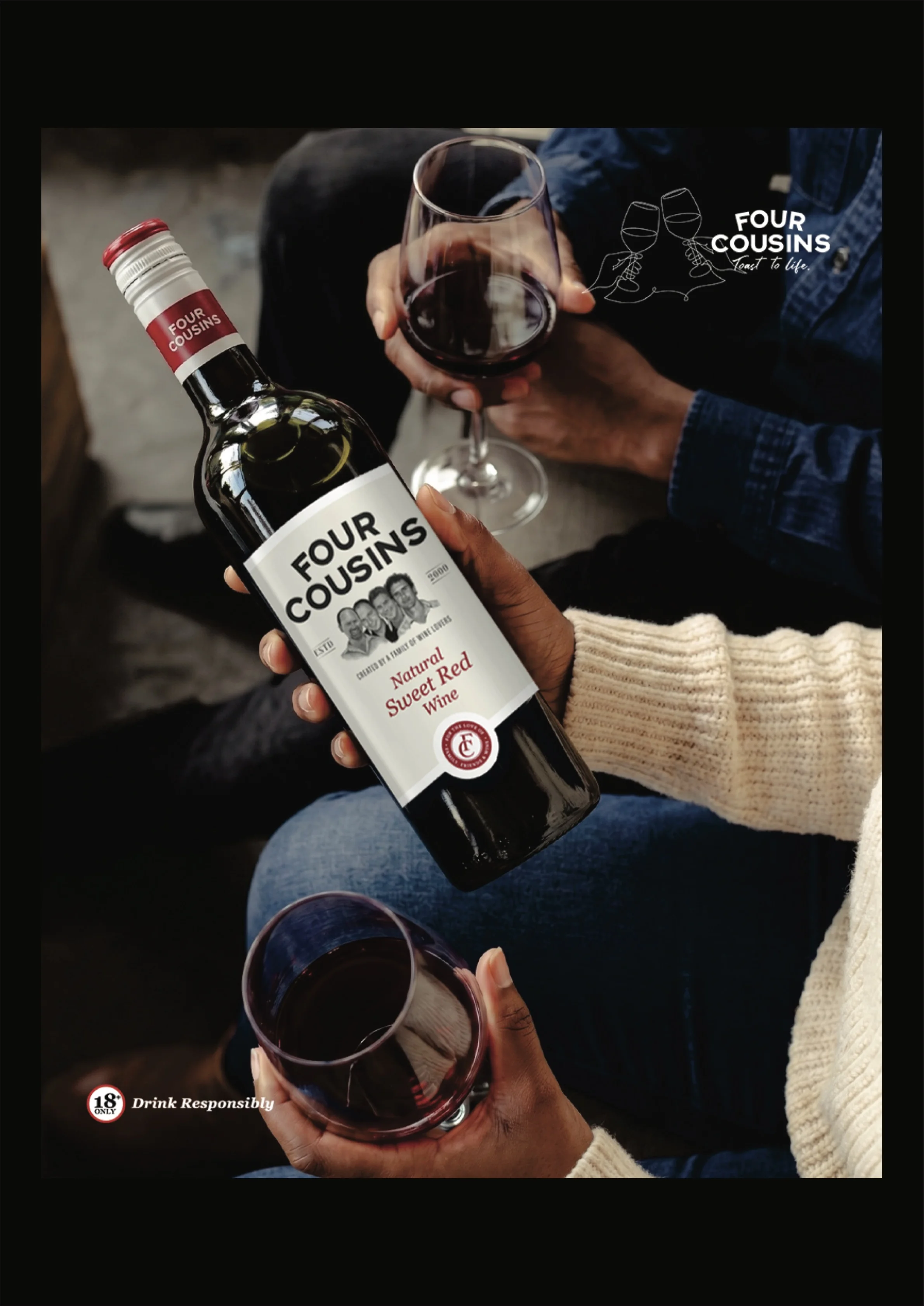 Four Cousins Natural Sweet Red Wine bottle being poured with glasses raised