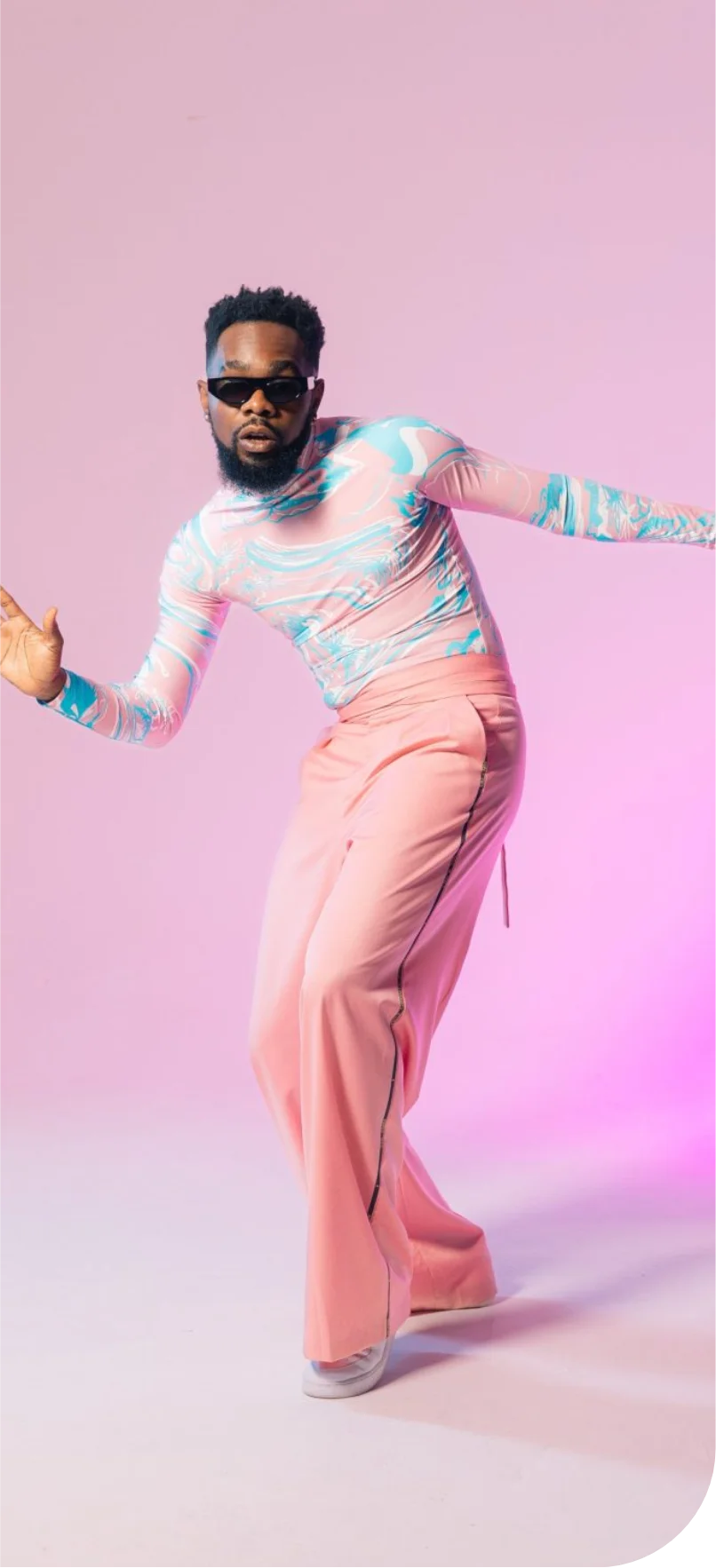 Kel-P in a pink and blue marbled outfit
